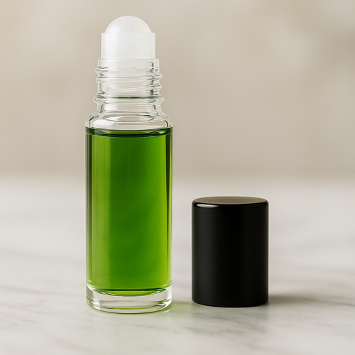 Green Irish Tweed inspired men's fragrance oil in clear glass roll-on bottle with gold cap